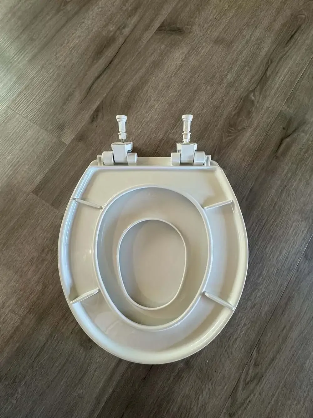 Bemis Little2Big Round Toilet Seat with Built-In Child Potty Training Ring